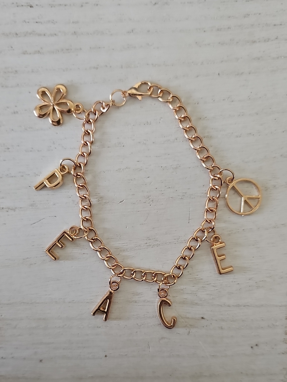 Gold-Tone Peace Charm Bracelet